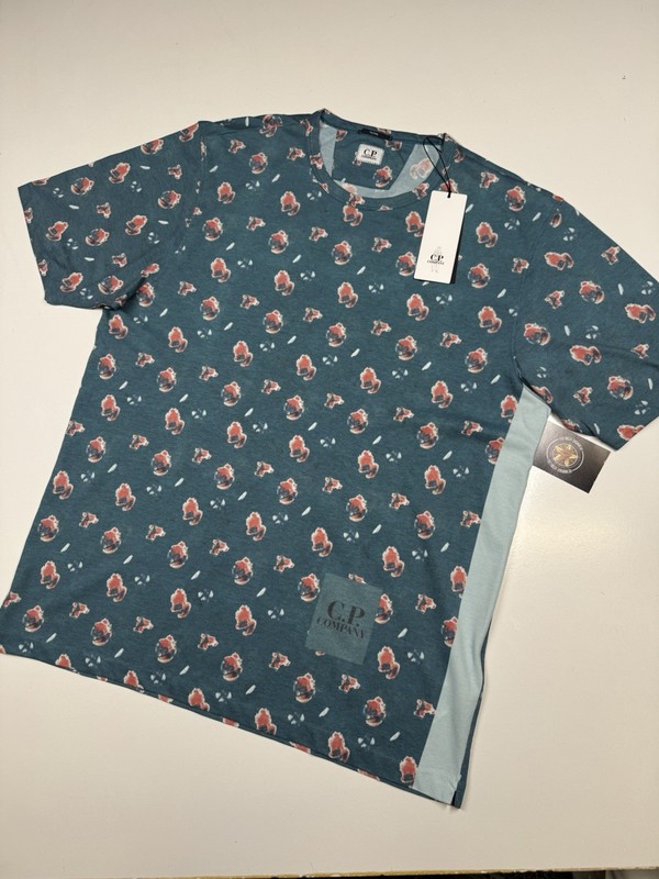 CP company tacting piquet T-shirt in sponged all Over print – Ink Blue- XL.