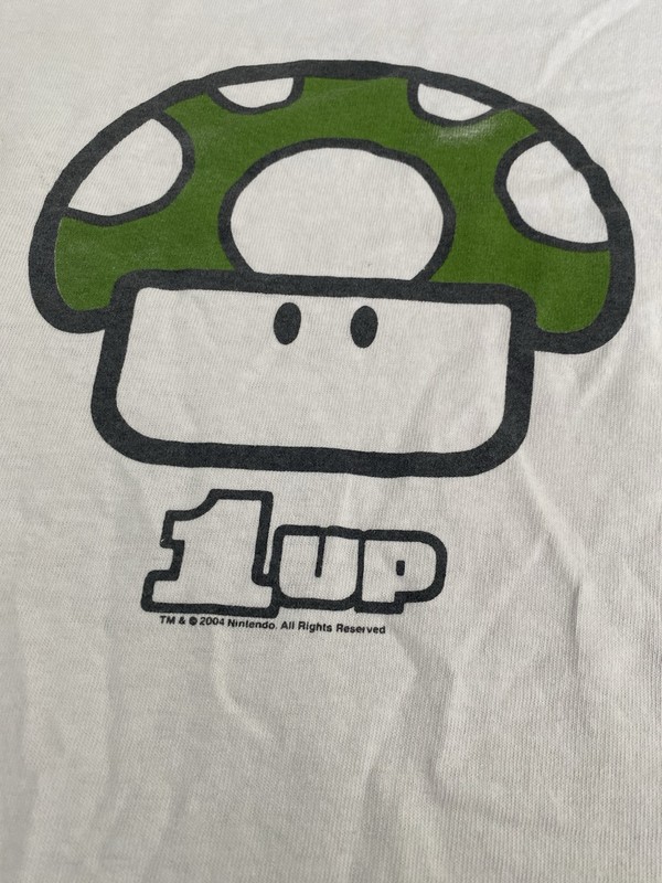1up mushroom shirt mario promo from 2004 with visible stains as shown